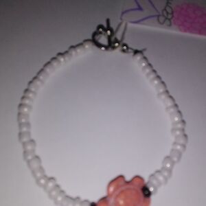 White Beaded Bracelet with Pink Flower Accent